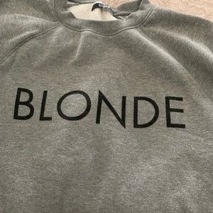 Brunette the label “blonde” sweatshirt.
